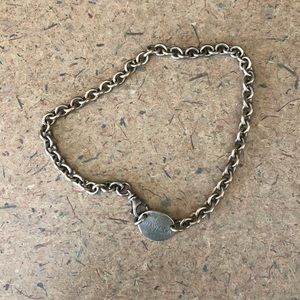 return to Tiffany’s signature choker necklace